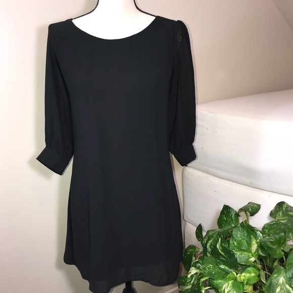 Black Shift Dress with Circular Cutout Hem